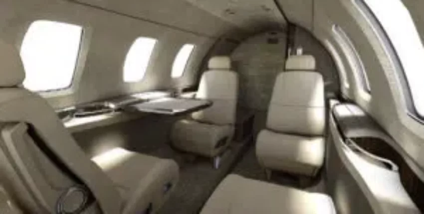 **Location jet privé - Intérieur luxueux avec sièges en cuir.**